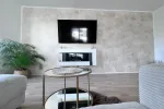 Wohnzimmerwand in italienischer Wischtechnik gestaltet